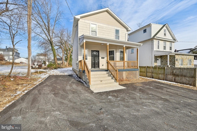 view of front of home featuring covered porch