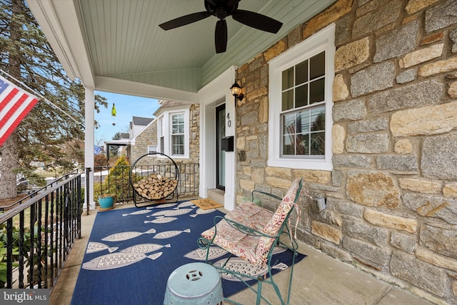 view of patio / terrace featuring ceiling fan