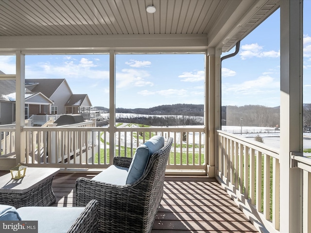 view of snow covered deck