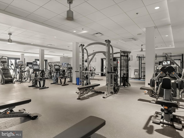 workout area with a drop ceiling