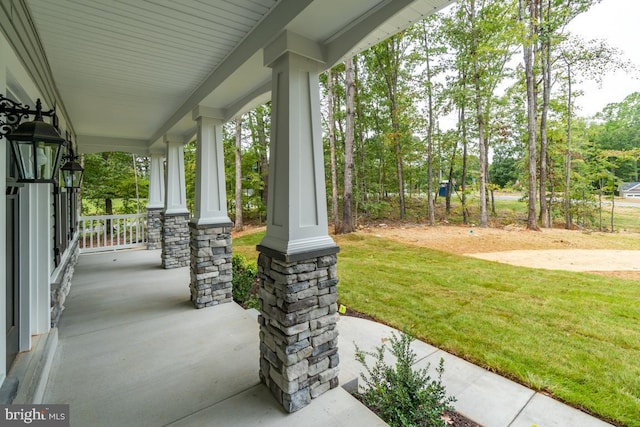 view of patio featuring a porch