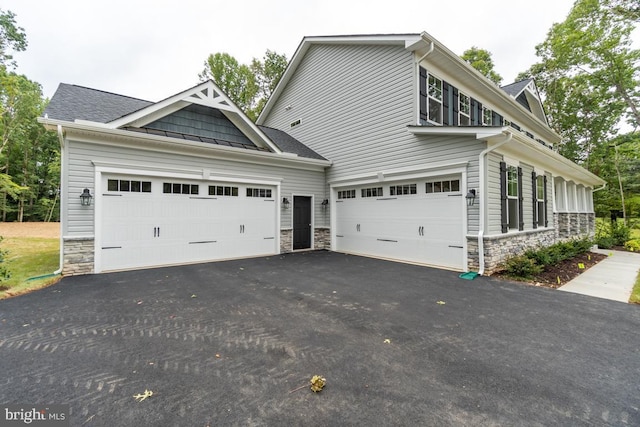 view of home's exterior with a garage