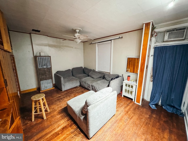 living room with ceiling fan, hardwood / wood-style floors, ornamental molding, and a wall mounted AC