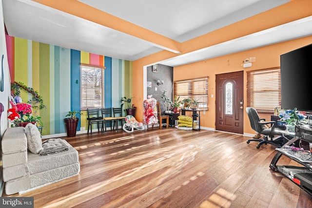 interior space featuring hardwood / wood-style flooring and plenty of natural light