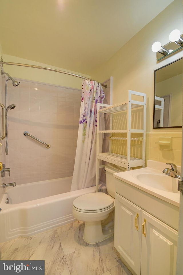 full bathroom featuring toilet, vanity, and shower / bath combination with curtain