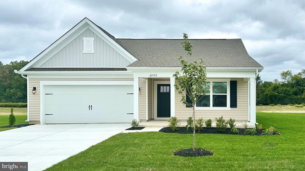1108 Albritton Ln, Salisbury, MD 21801 - view of front of property with a front lawn and a garage