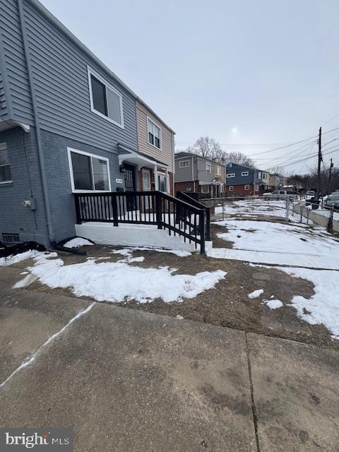 view of snow covered property