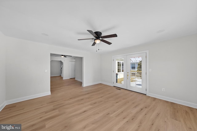 unfurnished living room with light hardwood / wood-style flooring, ceiling fan, and french doors