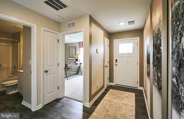 doorway featuring dark hardwood / wood-style flooring