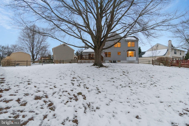 view of yard covered in snow