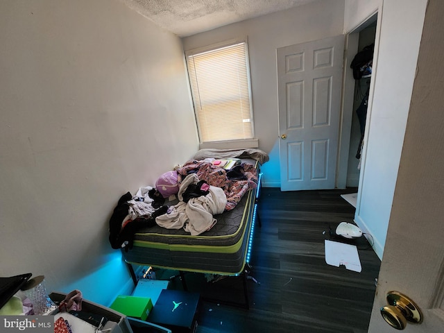 bedroom featuring a textured ceiling