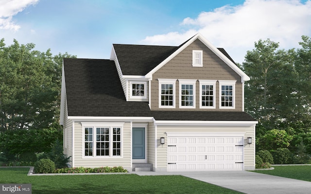 view of front of home featuring a garage and a front lawn