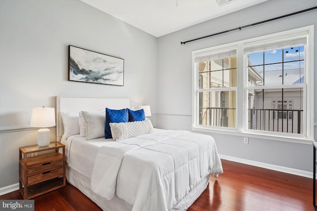 bedroom featuring wood-type flooring