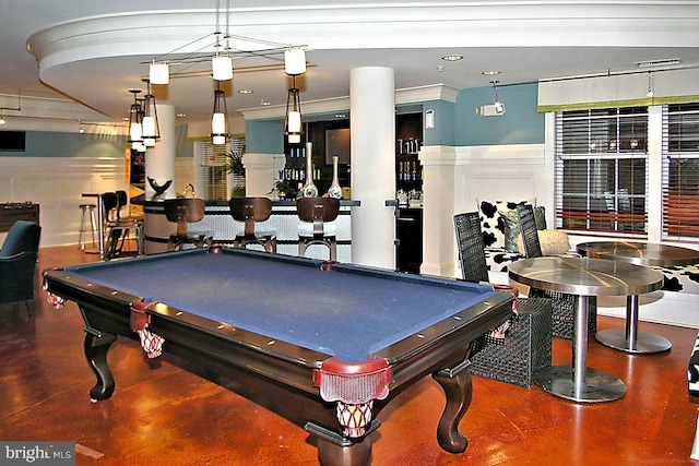 recreation room featuring bar area, concrete floors, and pool table