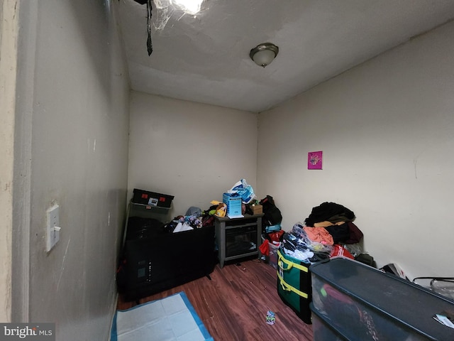 miscellaneous room with wood-type flooring