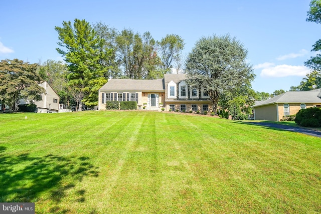 view of front of home with a front yard