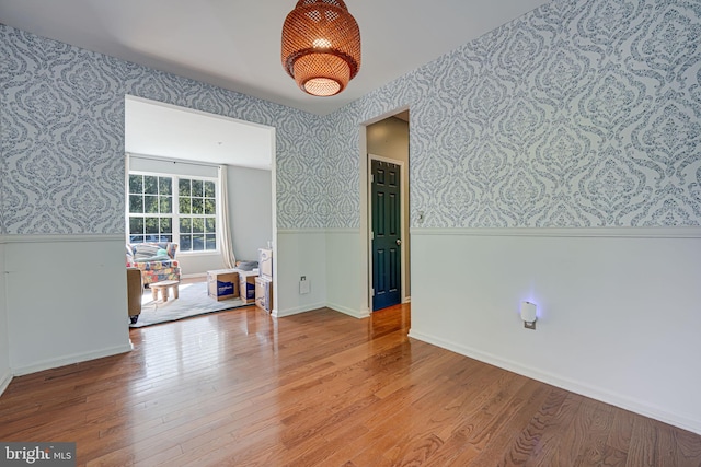 unfurnished room featuring light hardwood / wood-style floors