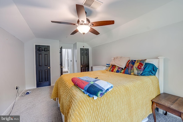 carpeted bedroom featuring ceiling fan and lofted ceiling