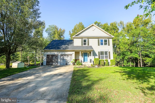 front facade with a garage and a front yard