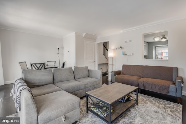 living room with ornamental molding and hardwood / wood-style floors