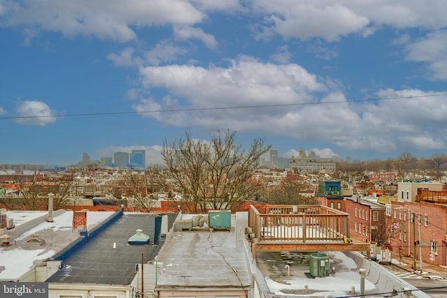 exterior space featuring a view of city and central air condition unit