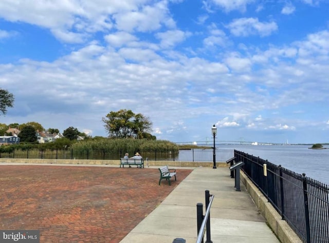 exterior space with a water view