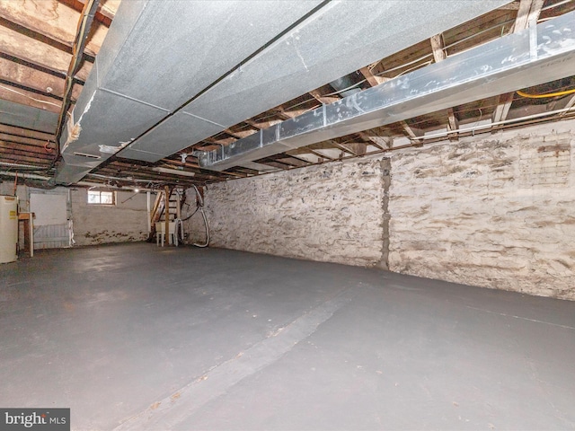 basement featuring water heater