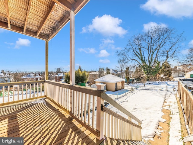 view of snow covered deck