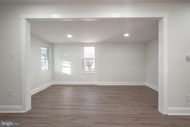 spare room featuring dark hardwood / wood-style floors