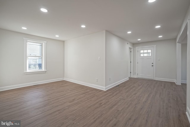 foyer featuring dark wood-type flooring