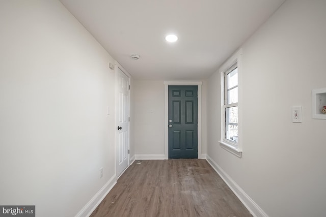 doorway to outside with hardwood / wood-style floors