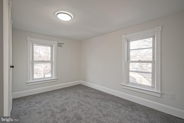 view of carpeted spare room