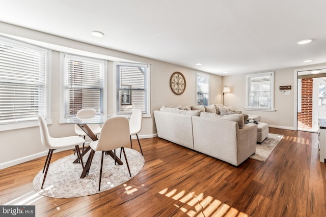 living room featuring hardwood / wood-style flooring and a wealth of natural light