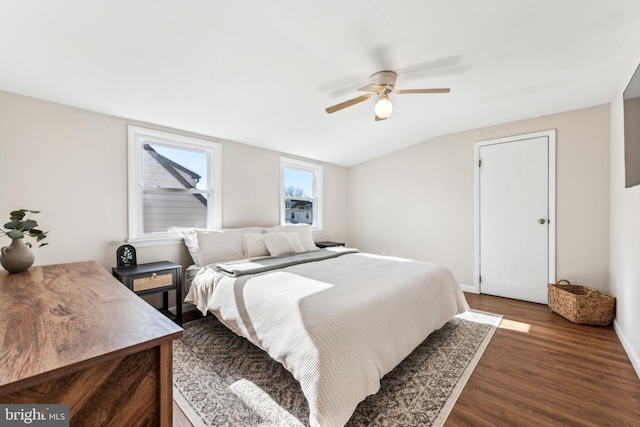 bedroom featuring dark wood-type flooring and ceiling fan