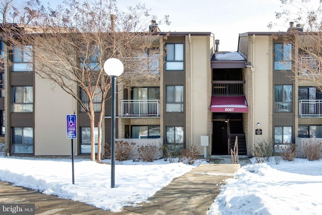 view of snow covered building