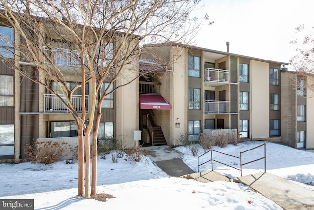 view of snow covered building