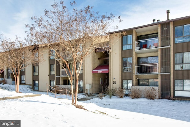 view of snow covered building