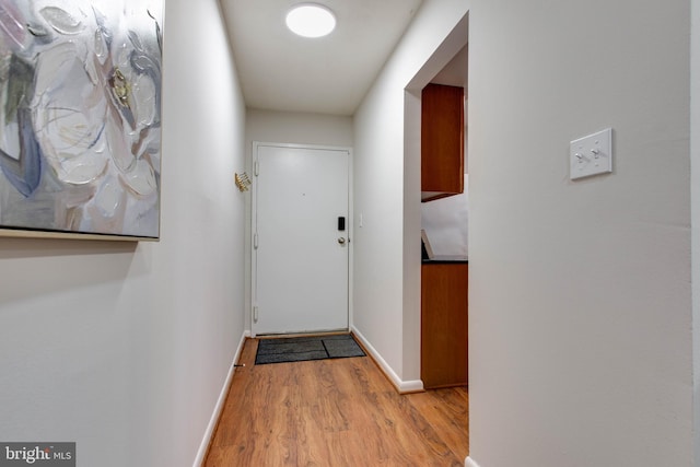 doorway featuring light hardwood / wood-style floors