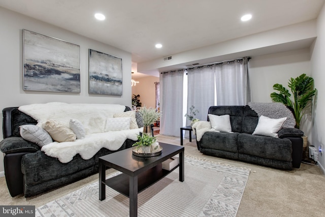 living room with light colored carpet