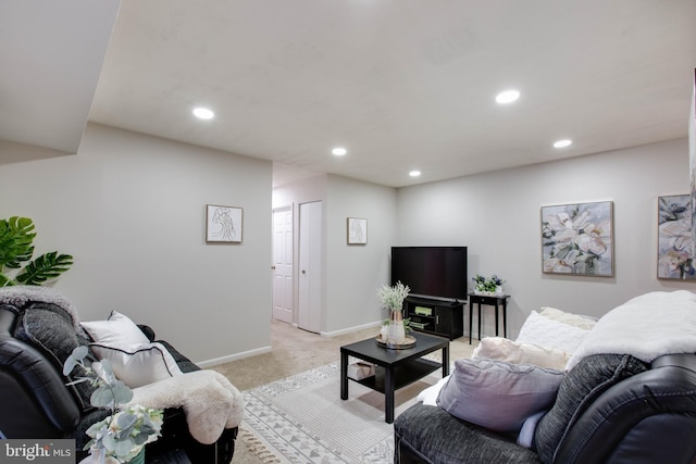 living room featuring light carpet