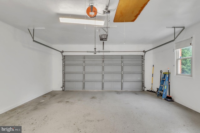 garage featuring a garage door opener