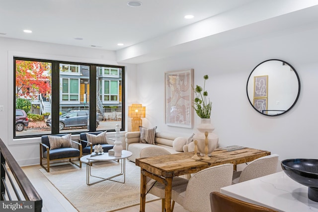 living room with light hardwood / wood-style flooring