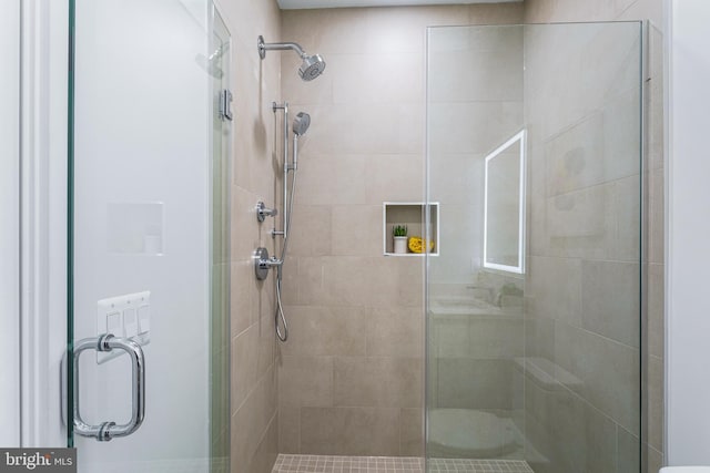 bathroom with an enclosed shower