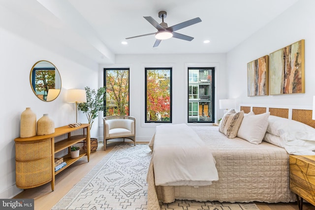 bedroom featuring hardwood / wood-style flooring and ceiling fan