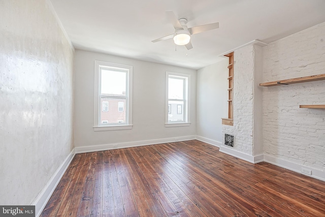 unfurnished room with ceiling fan and dark hardwood / wood-style floors