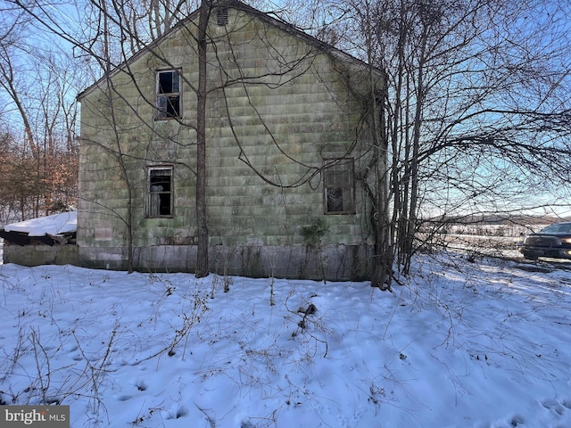 view of snow covered property