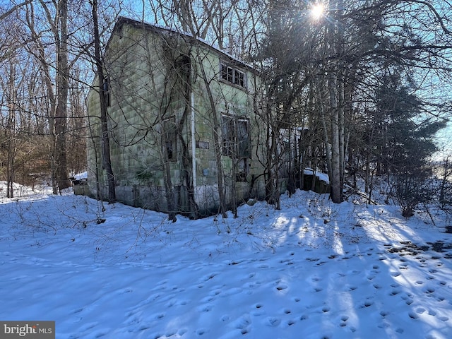 view of snow covered property