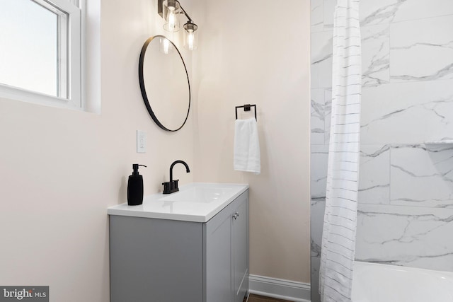 bathroom featuring vanity and shower / bath combination