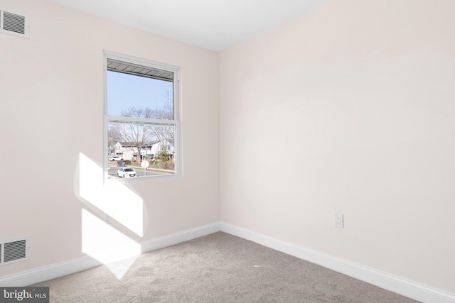 empty room with carpet floors