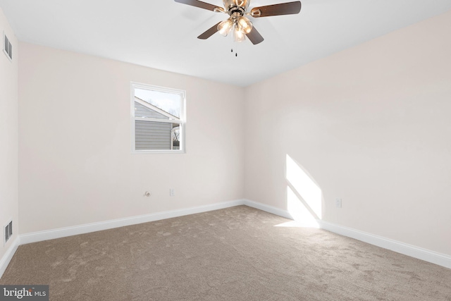 unfurnished room featuring carpet flooring and ceiling fan